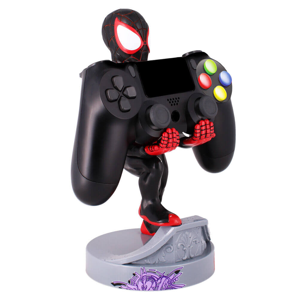 Black gaming controller with red accents on a stand featuring a spider-Man design.